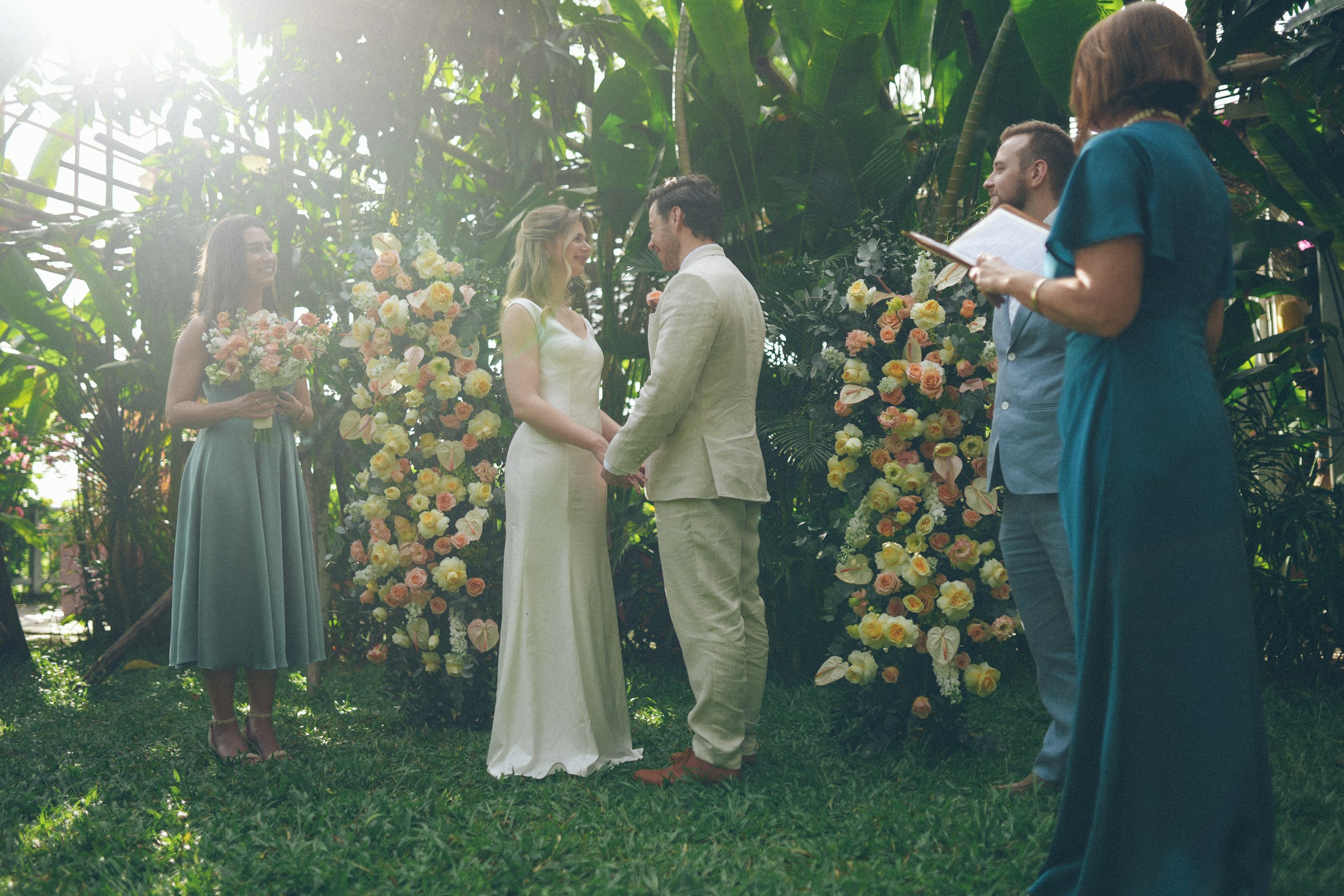 Couple exchanging vows with a marriage officiant